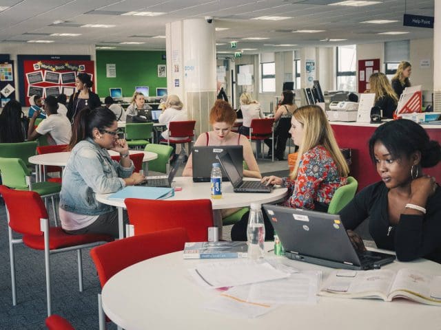 Students work in College Green Centre Library